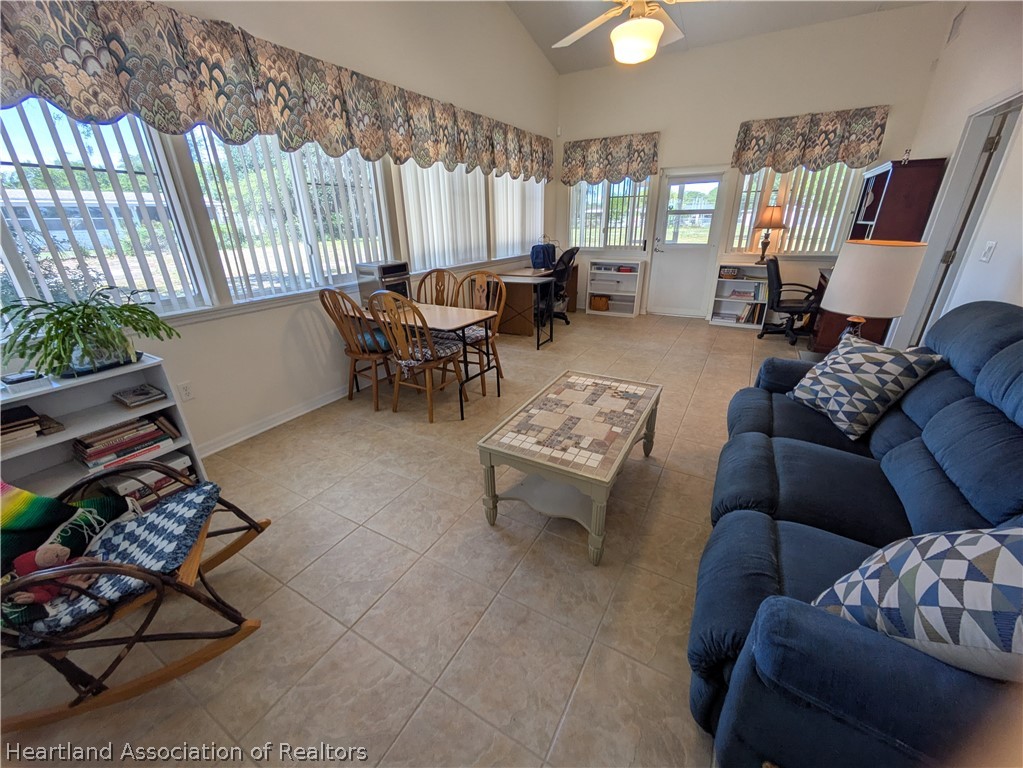 2701 Brunns Road Sebring, FL 33872 - Photo 7 of 29 a living room with furniture and a large window