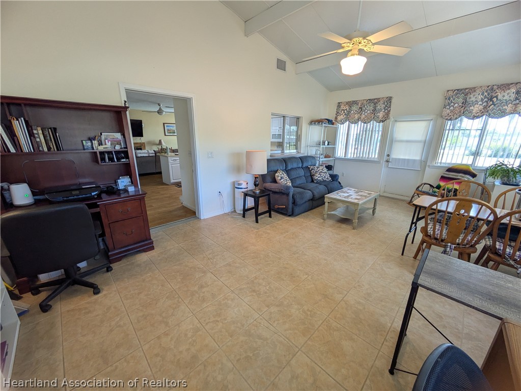 2701 Brunns Road Sebring, FL 33872 - Photo 9 of 29 a living room with furniture and a window