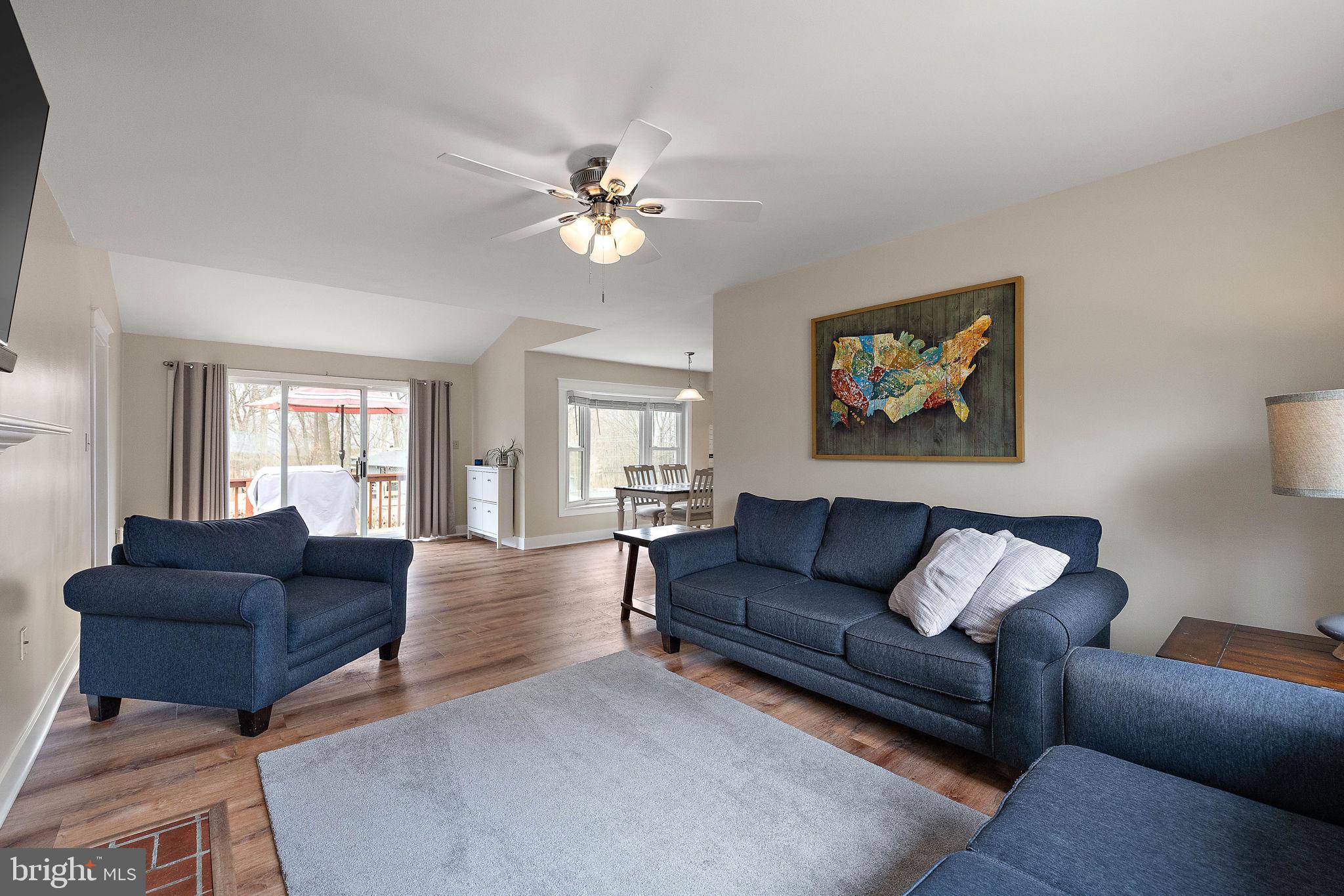 1003 White Birch Drive Newark, DE 19713 - Photo 11 of 54 a living room with furniture ceiling fan and a window