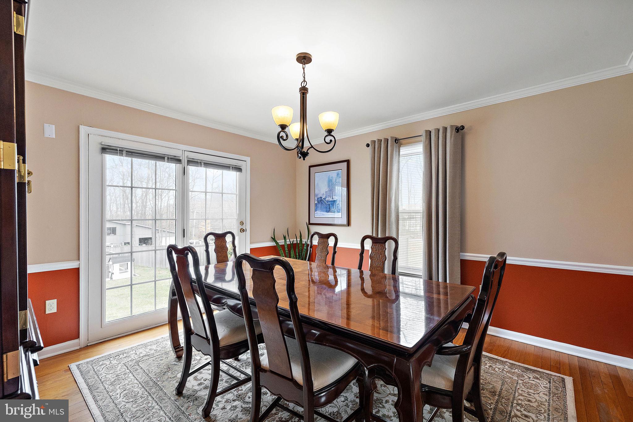1003 White Birch Drive Newark, DE 19713 - Photo 16 of 54 a view of a dining room with furniture window and wooden floor