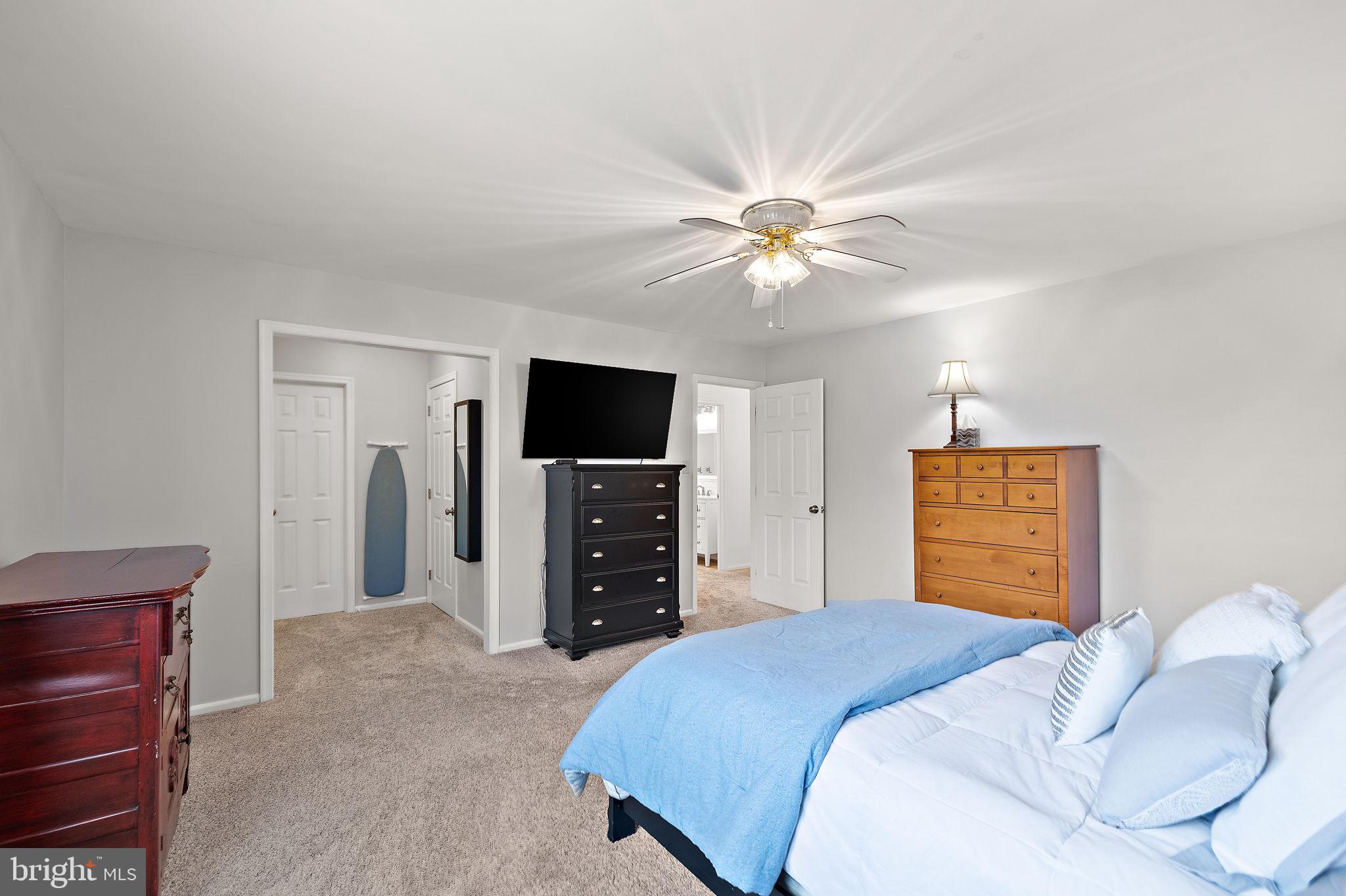 1003 White Birch Drive Newark, DE 19713 - Photo 24 of 54 a bedroom with a bed and a flat screen tv