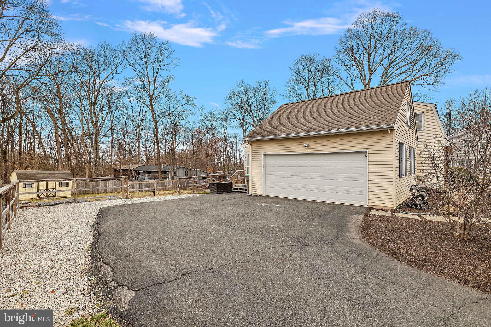 1003 White Birch Drive Newark, DE 19713 - Photo 46 of 54 a view of a house with a yard and garage