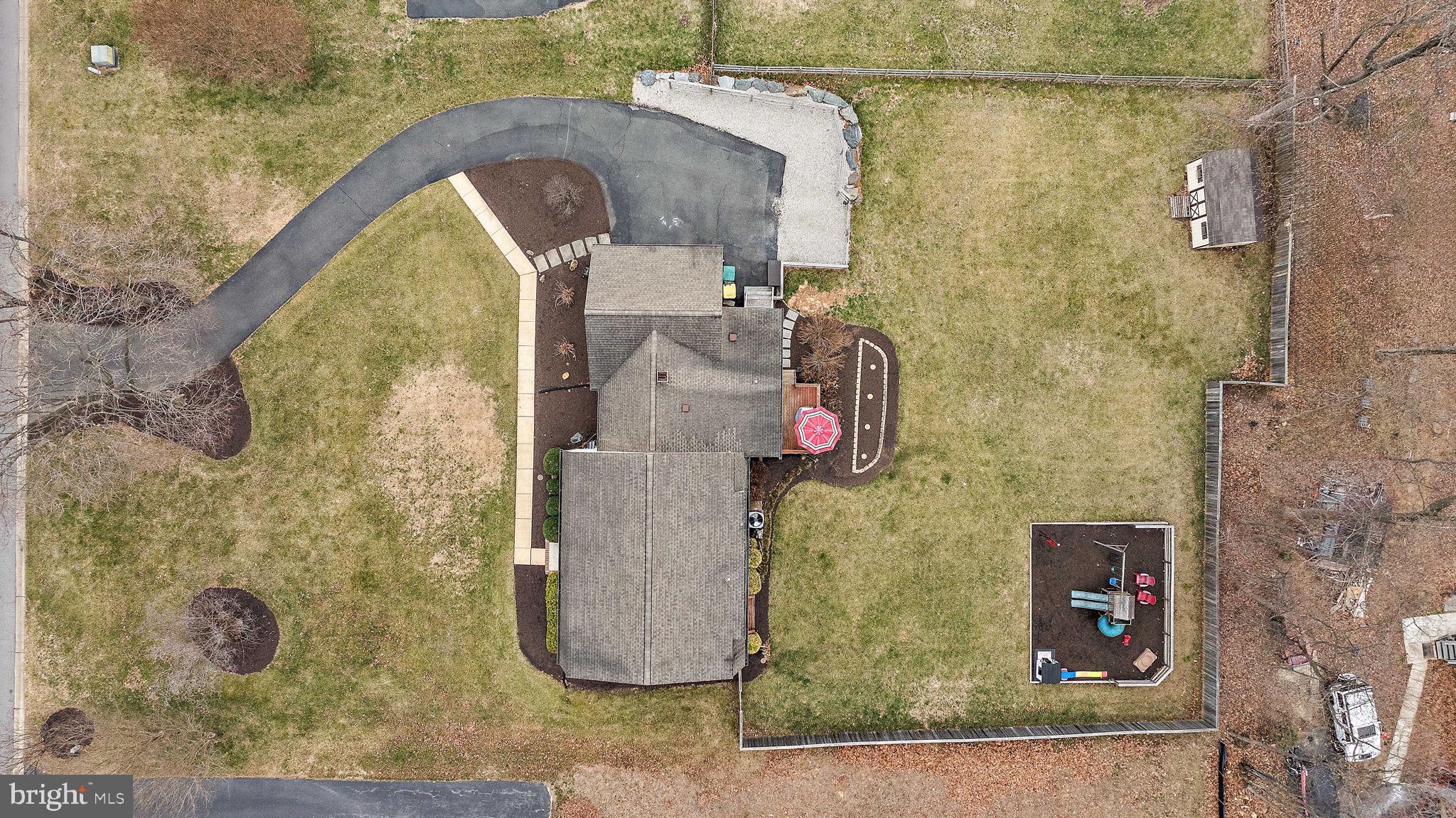 1003 White Birch Drive Newark, DE 19713 - Photo 54 of 54 a bathroom with a granite countertop shower and mirror