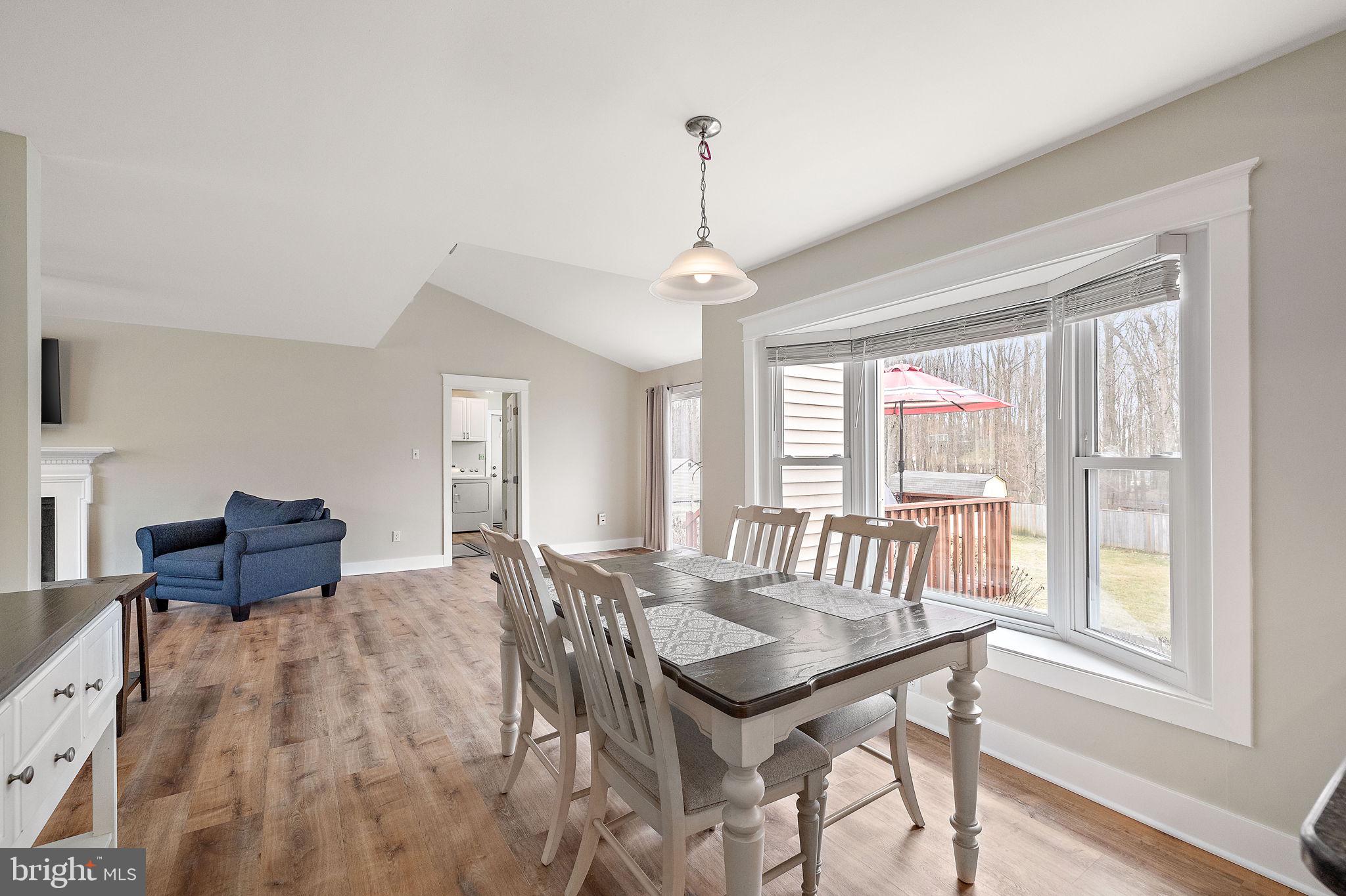 1003 White Birch Drive Newark, DE 19713 - Photo 6 of 54 a view of a dining room with furniture window and wooden floor