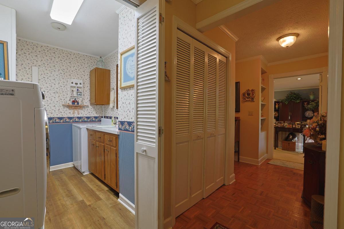 56 Claymont Road McIntyre, GA 31054 - Photo 45 of 75 a bathroom with a granite countertop sink a mirror and shower