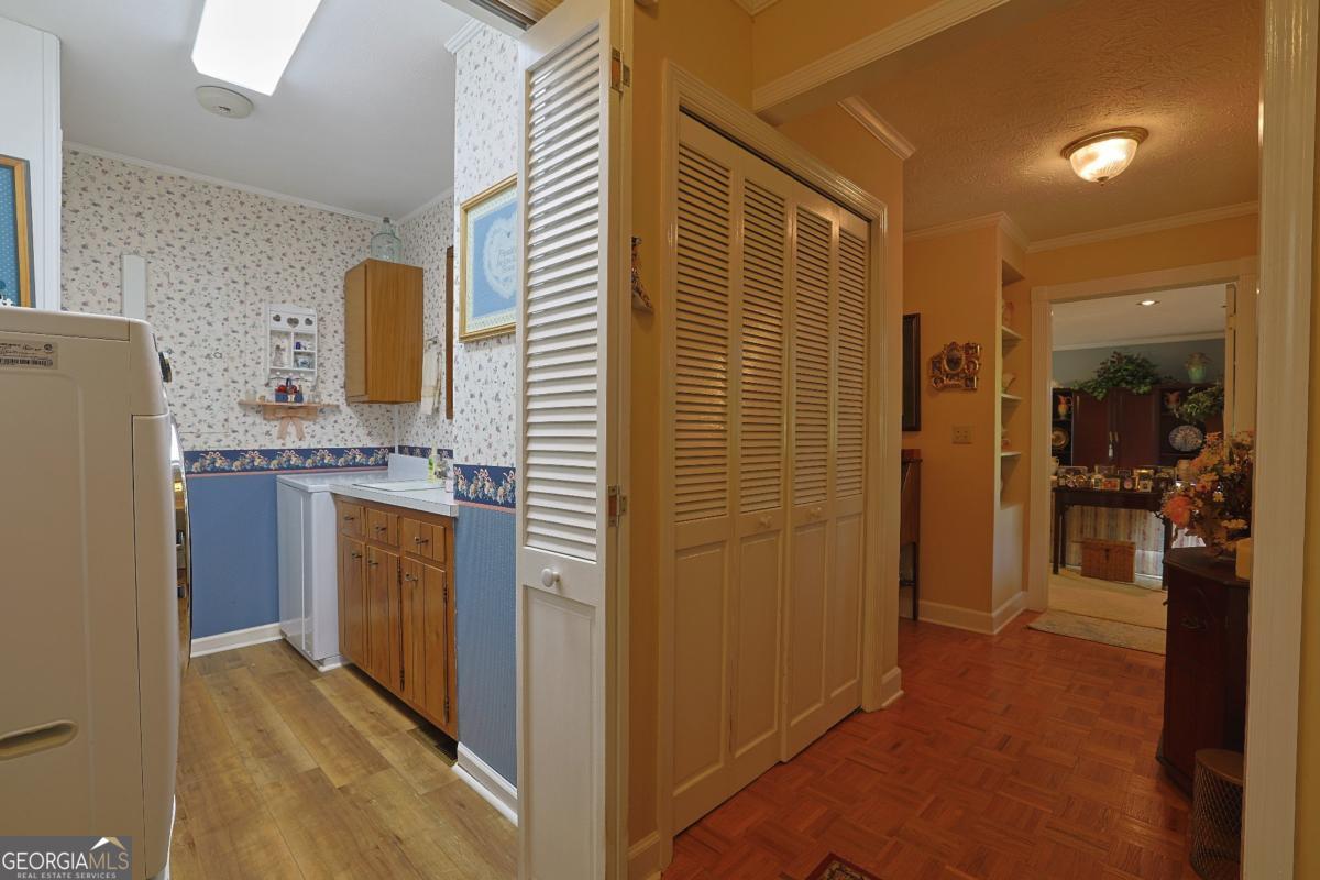56 Claymont Road McIntyre, GA 31054 - Photo 46 of 75 a bathroom with a granite countertop sink a mirror and shower
