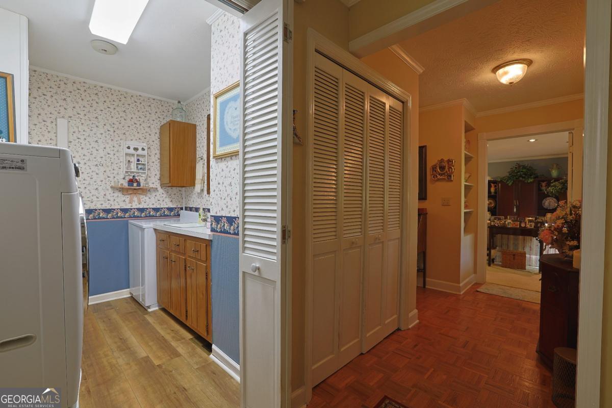 56 Claymont Road McIntyre, GA 31054 - Photo 58 of 75 a bathroom with a granite countertop sink a mirror and shower