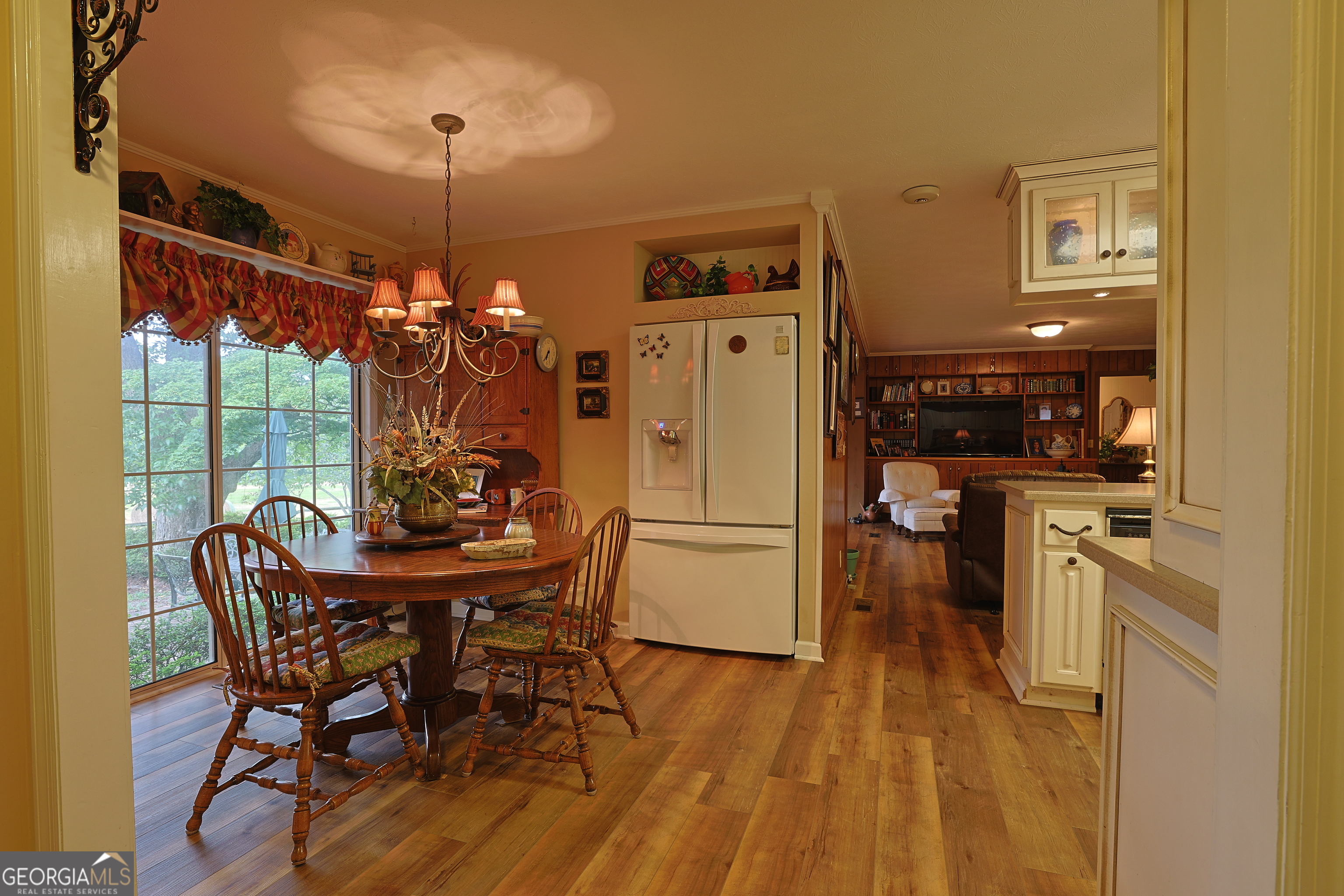 56 Claymont Road McIntyre, GA 31054 - Photo 75 of 75 a view of a dining room with furniture window and wooden floor