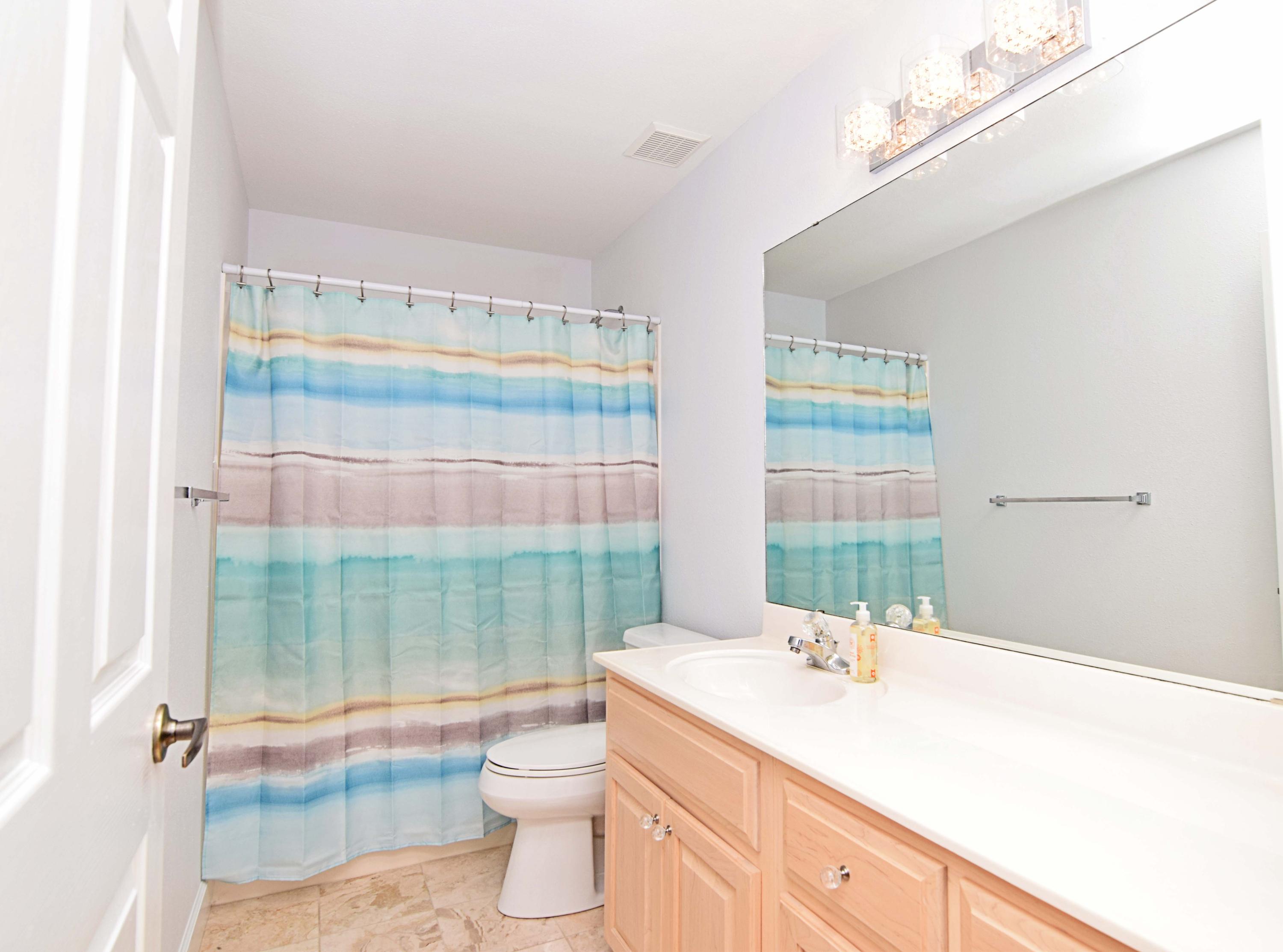 1815 Huntington Road Niceville, FL 32578 - Photo 34 of 51 a bathroom with a sink toilet and shower
