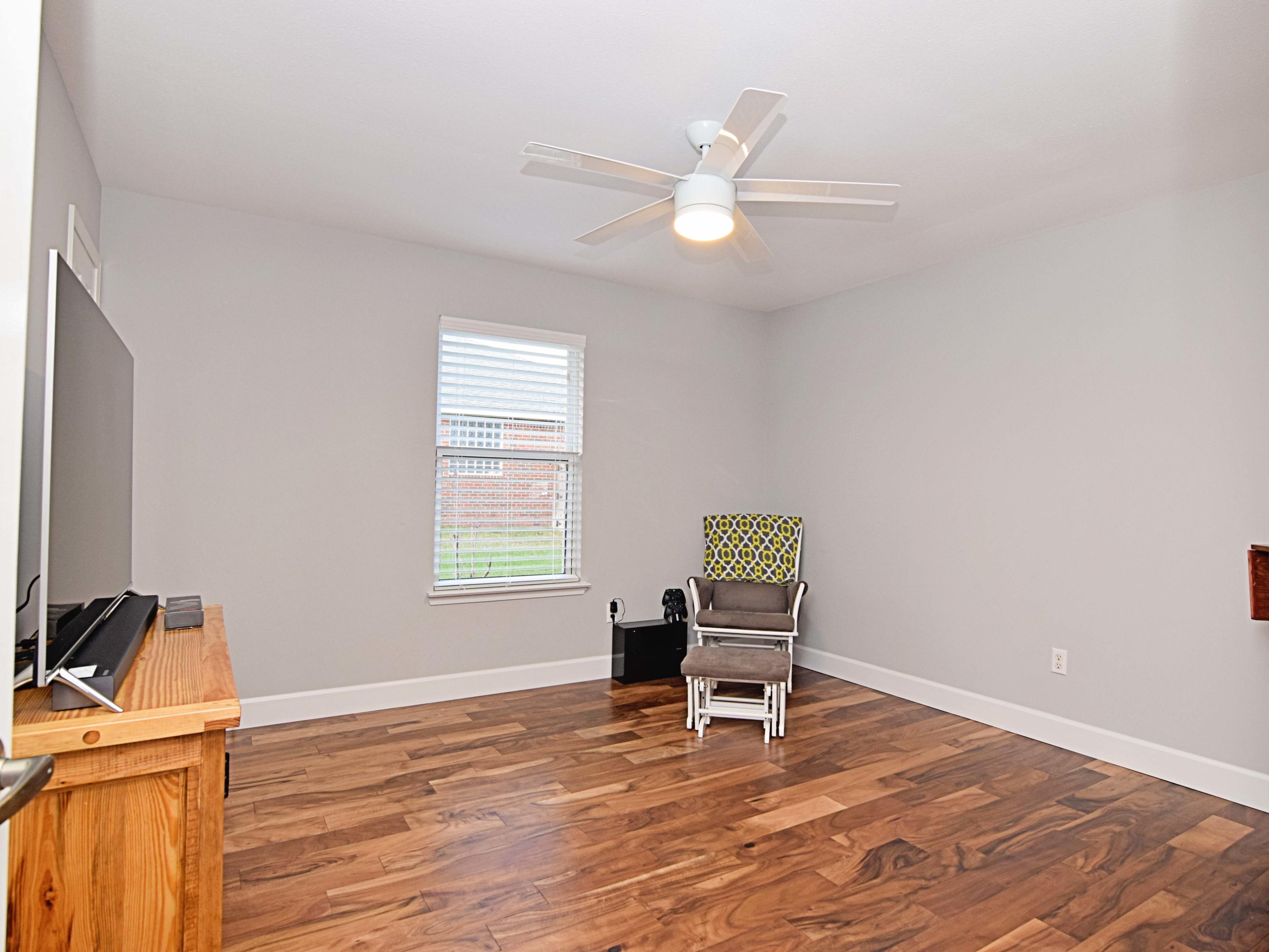 1815 Huntington Road Niceville, FL 32578 - Photo 35 of 51 a chair and a table in a room