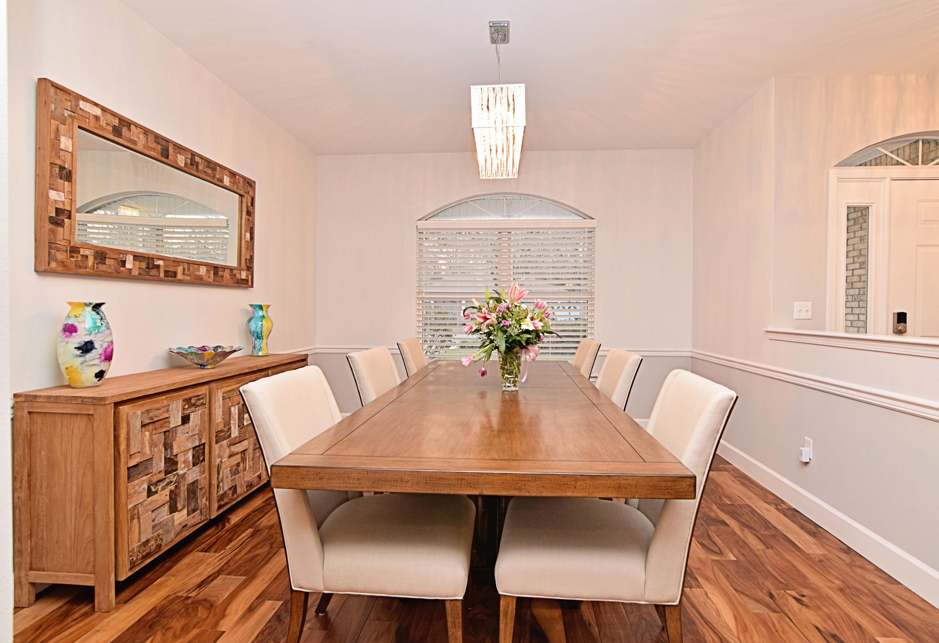 1815 Huntington Road Niceville, FL 32578 - Photo 5 of 51 a view of a dining room with furniture and wooden floor