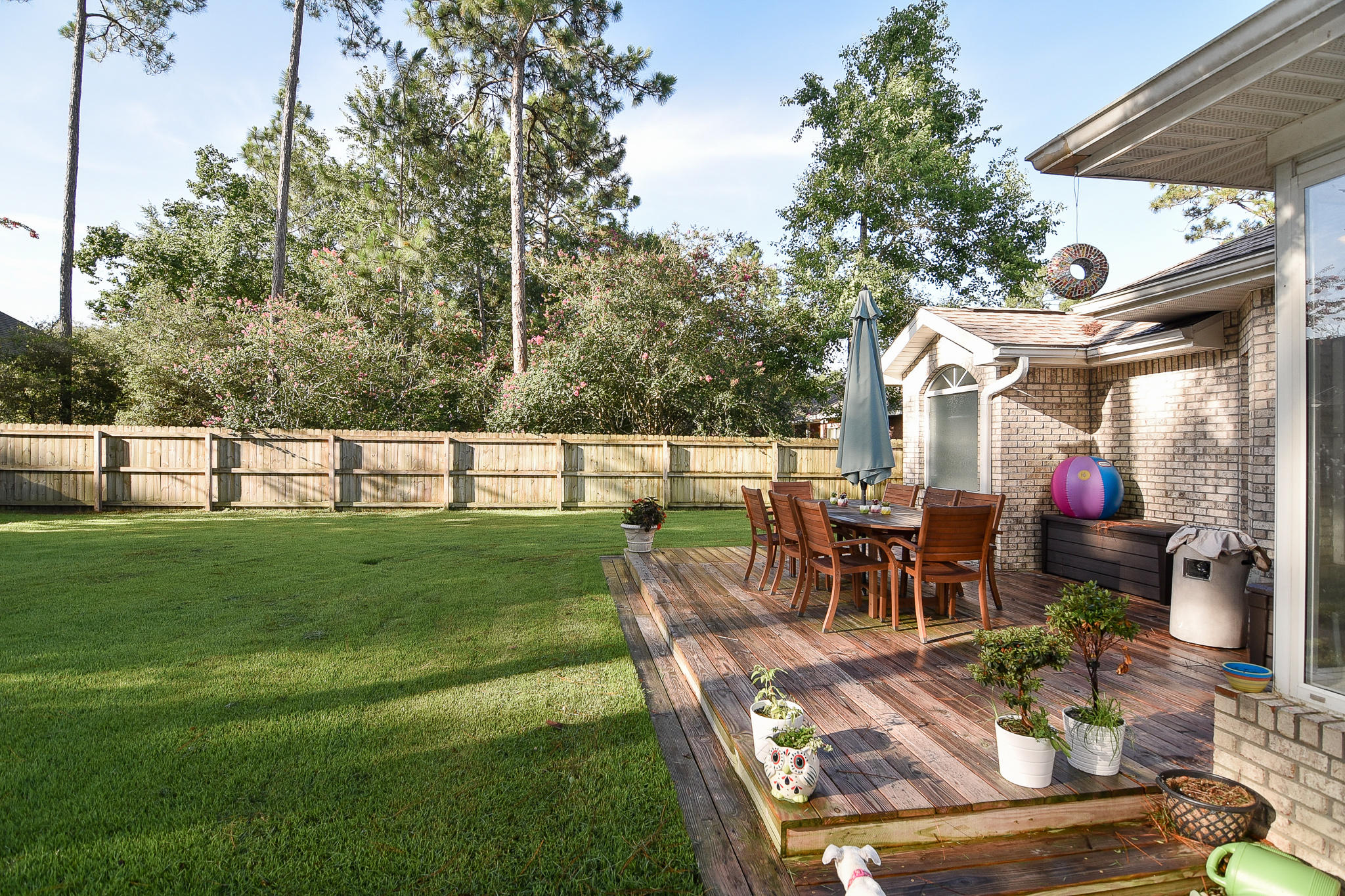 1815 Huntington Road Niceville, FL 32578 - Photo 44 of 51 a view of a house with backyard and sitting area