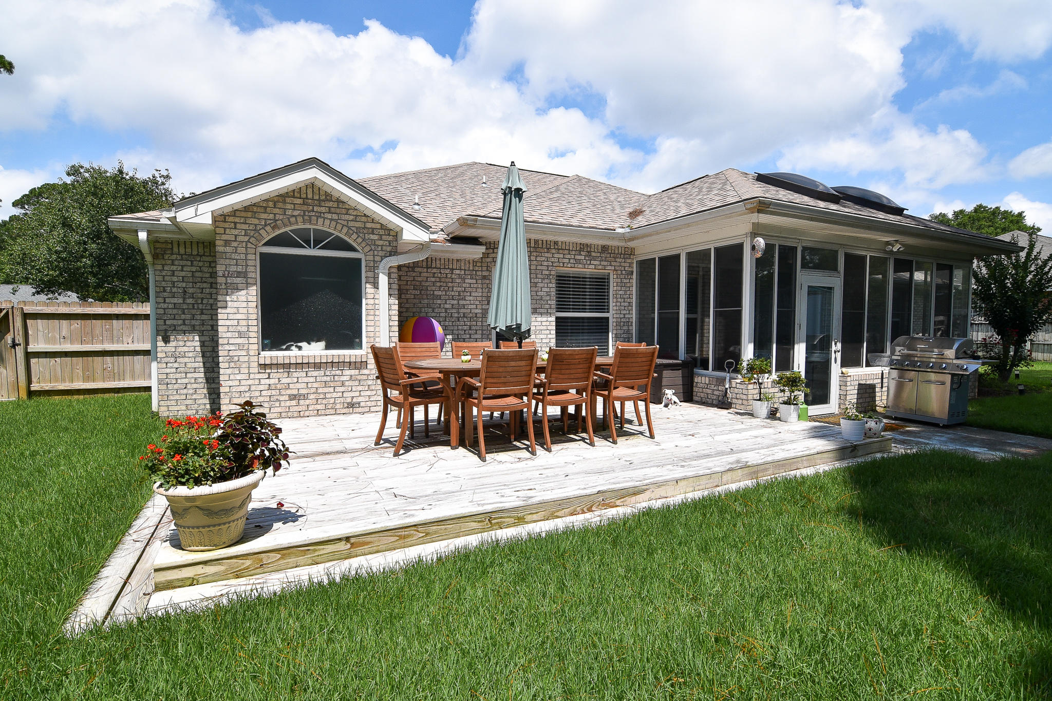 1815 Huntington Road Niceville, FL 32578 - Photo 46 of 51 a view of a house with furniture and garden