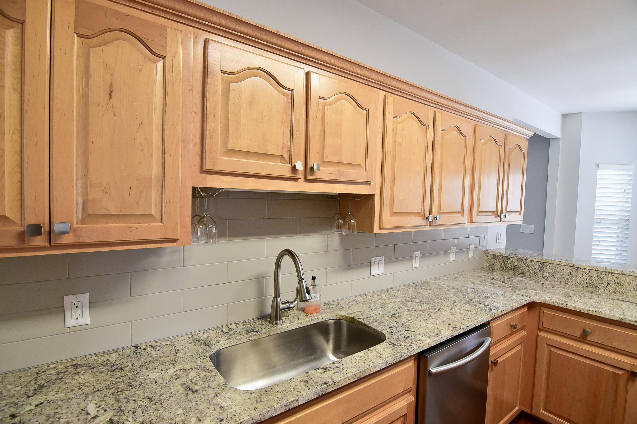 1815 Huntington Road Niceville, FL 32578 - Photo 51 of 51 a kitchen with stainless steel appliances granite countertop a sink a refrigerator and cabinets