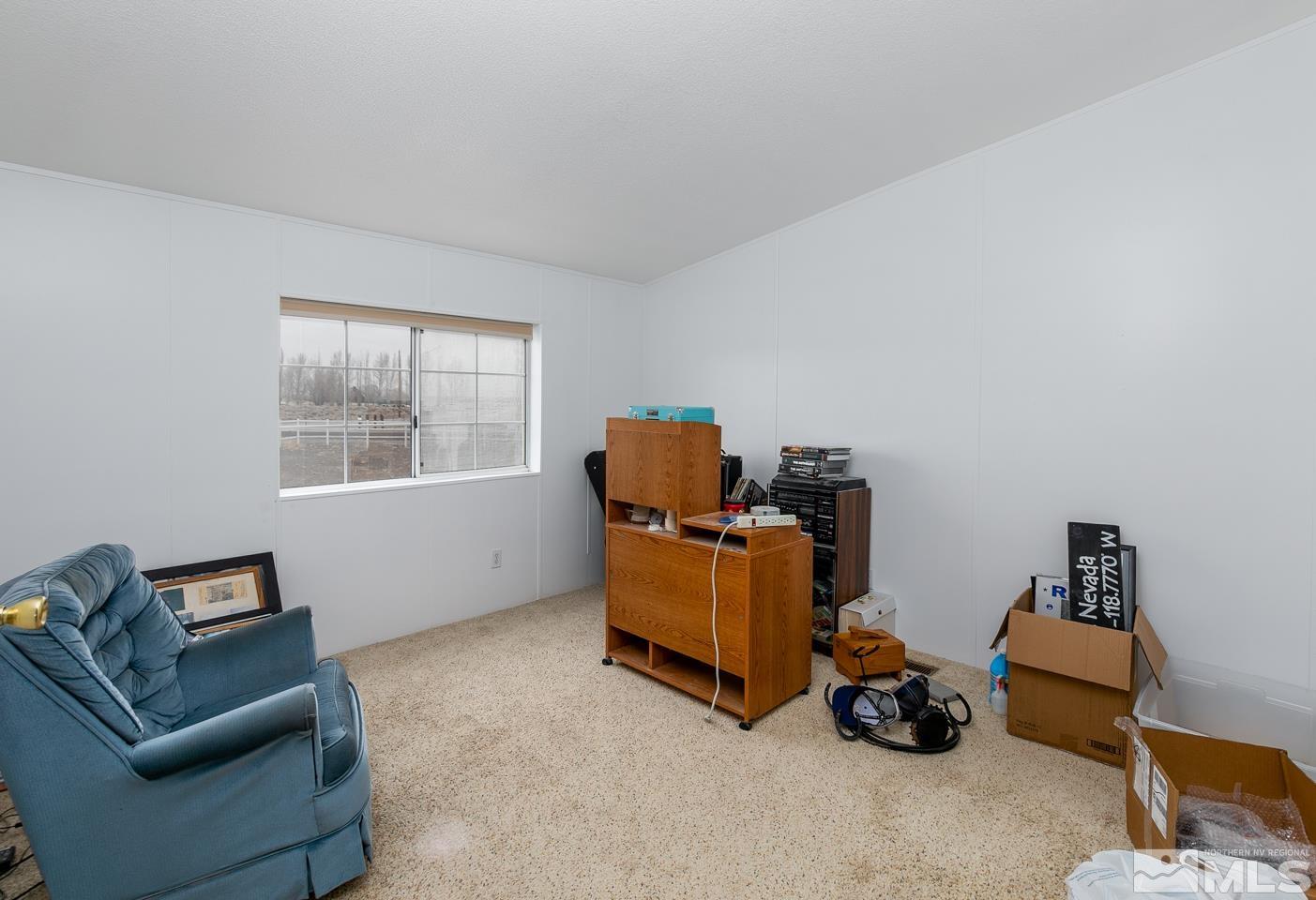 5215 Workman Road Fallon, NV 89406 - Photo 15 of 21 a living room with furniture and a window