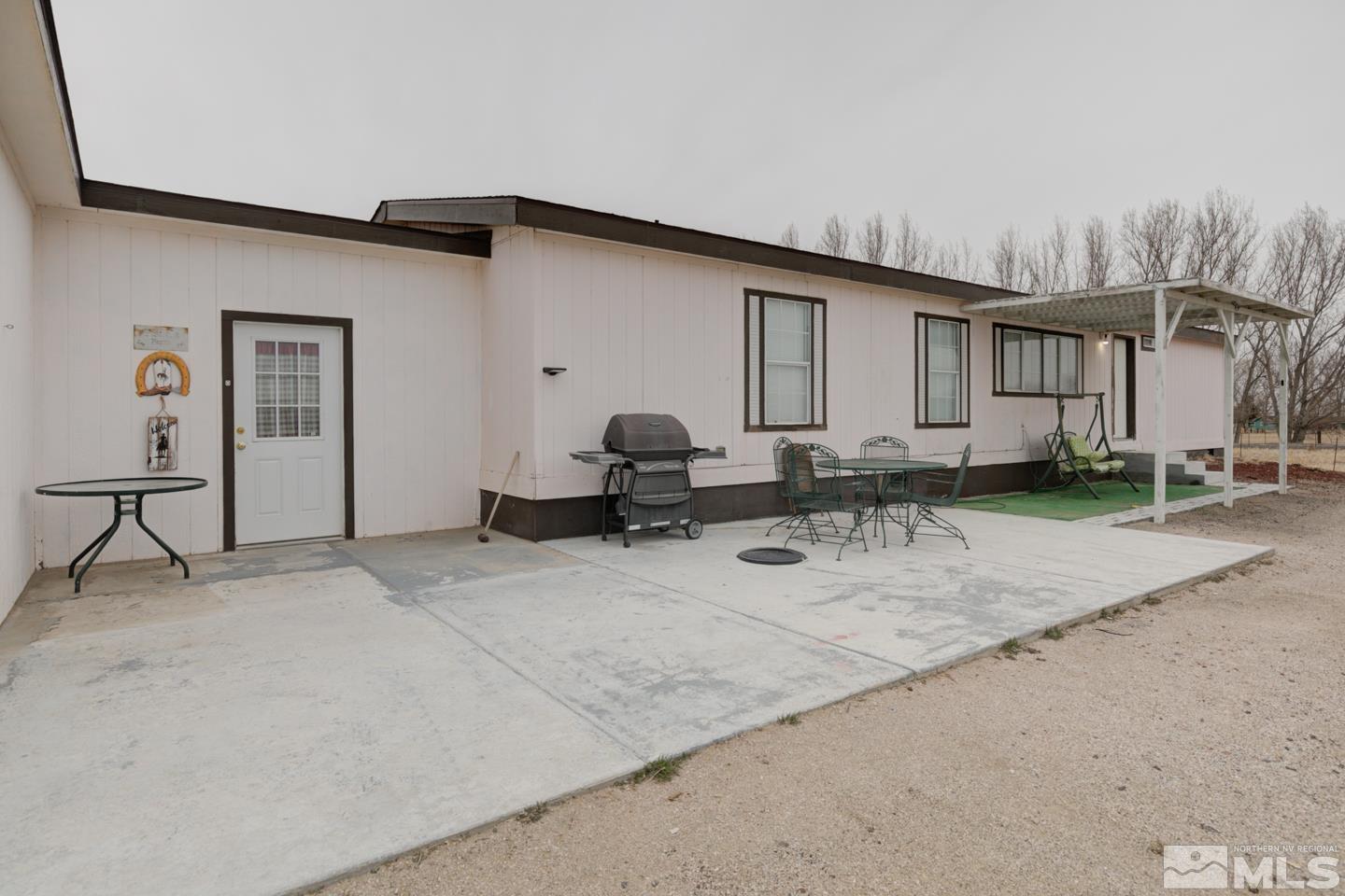 5215 Workman Road Fallon, NV 89406 - Photo 2 of 21 a view of a house with patio
