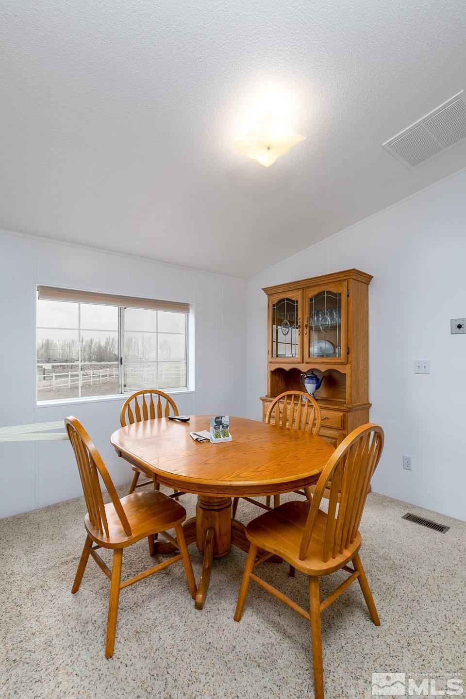 5215 Workman Road Fallon, NV 89406 - Photo 9 of 21 a dining room with furniture and window