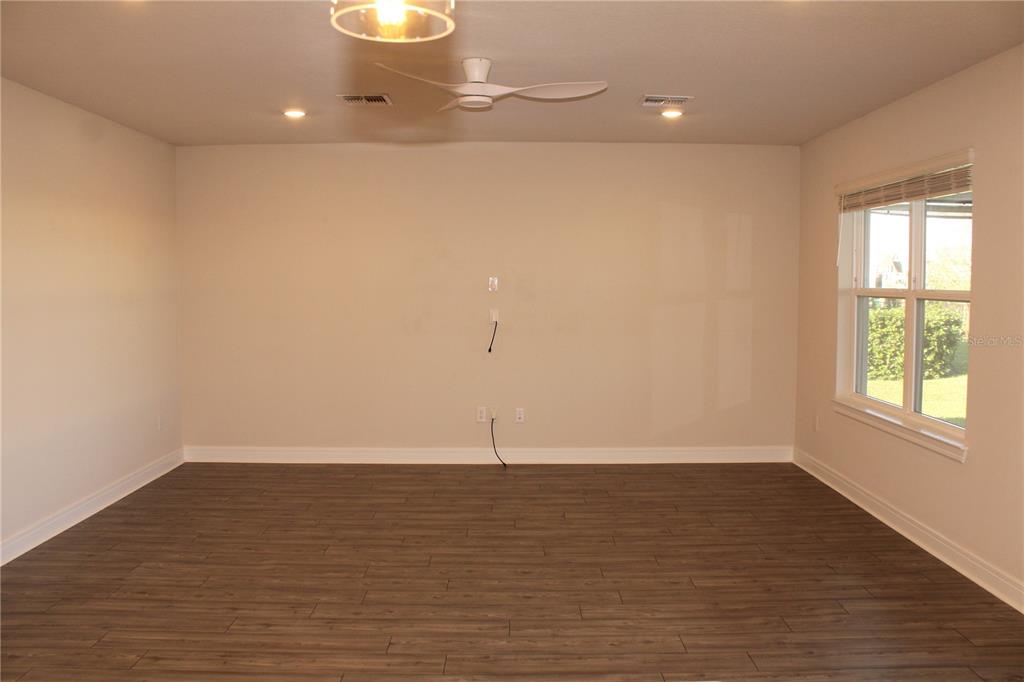 8232 Reefbay Cove Parrish, FL 34221 - Photo 12 of 64 a view of an empty room with a window