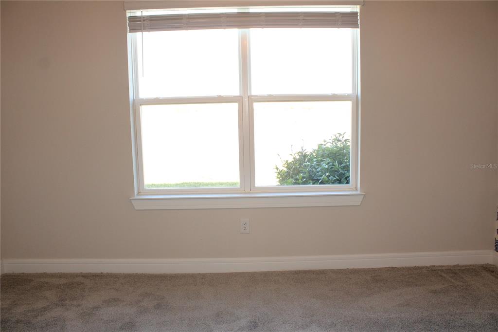 8232 Reefbay Cove Parrish, FL 34221 - Photo 20 of 64 an empty room with a window