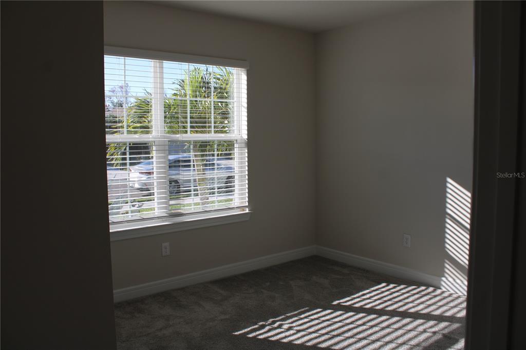 8232 Reefbay Cove Parrish, FL 34221 - Photo 28 of 64 a view of an empty room and a window
