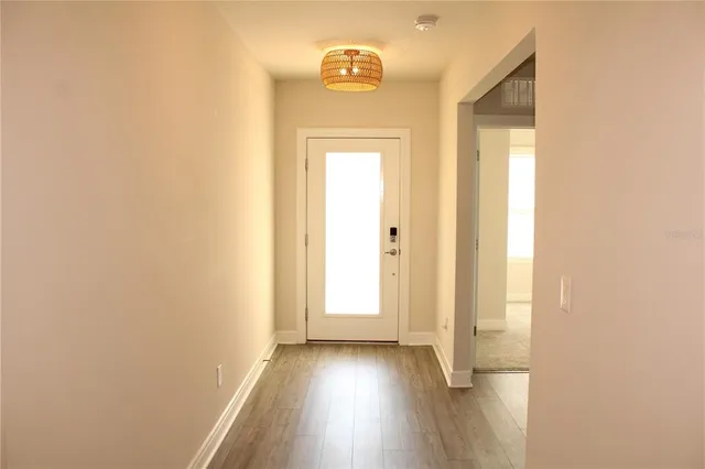 a front view of house with yard and outdoor seating