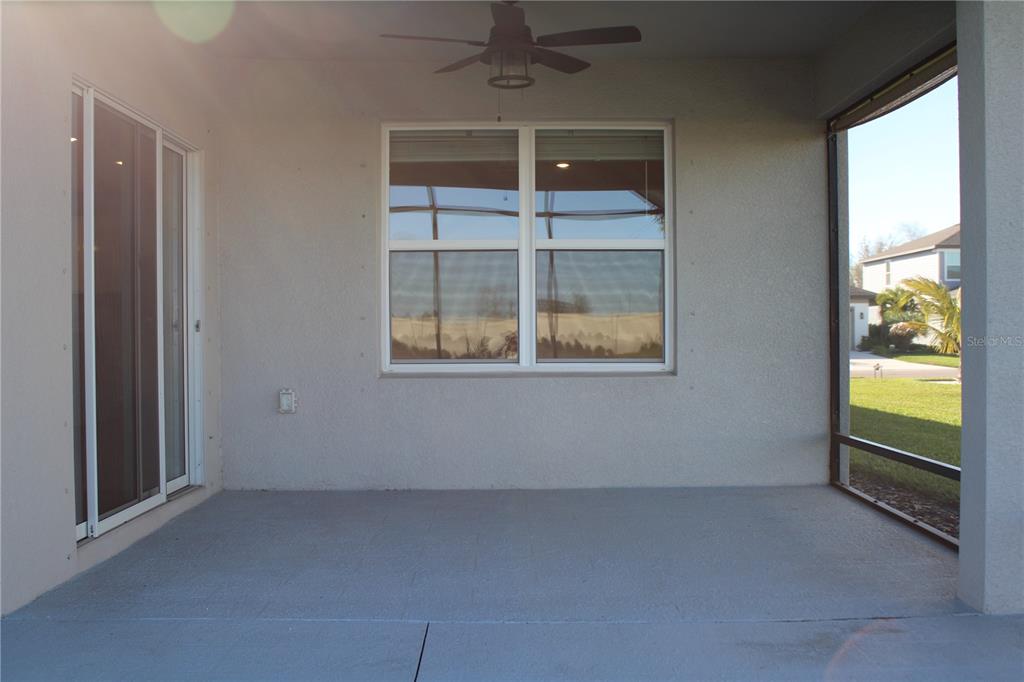 8232 Reefbay Cove Parrish, FL 34221 - Photo 41 of 64 an empty room with windows