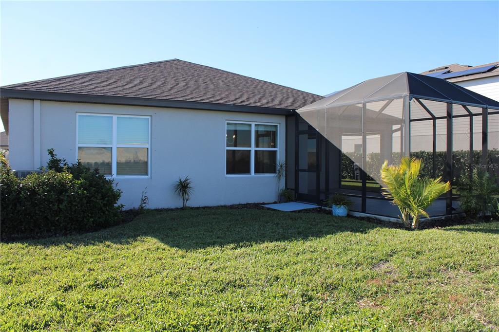 8232 Reefbay Cove Parrish, FL 34221 - Photo 46 of 64 a house view with a garden space