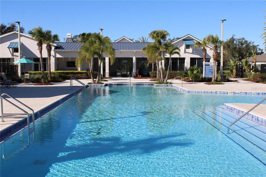 8232 Reefbay Cove Parrish, FL 34221 - Photo 53 of 64 a view of a house with swimming pool and sitting area