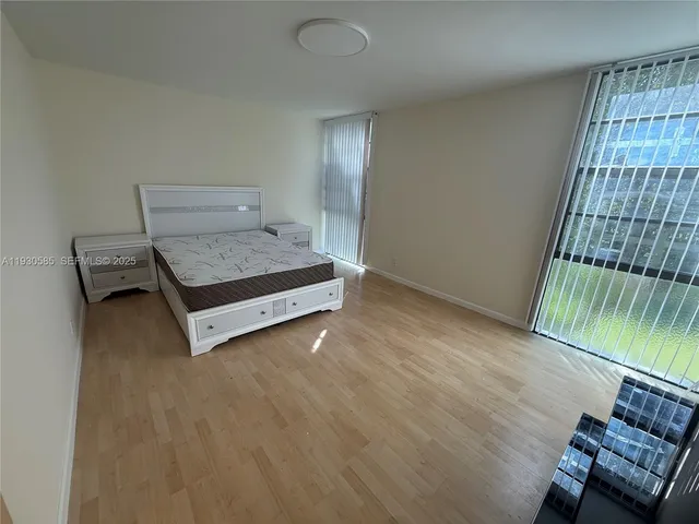 a view of livingroom with furniture and window