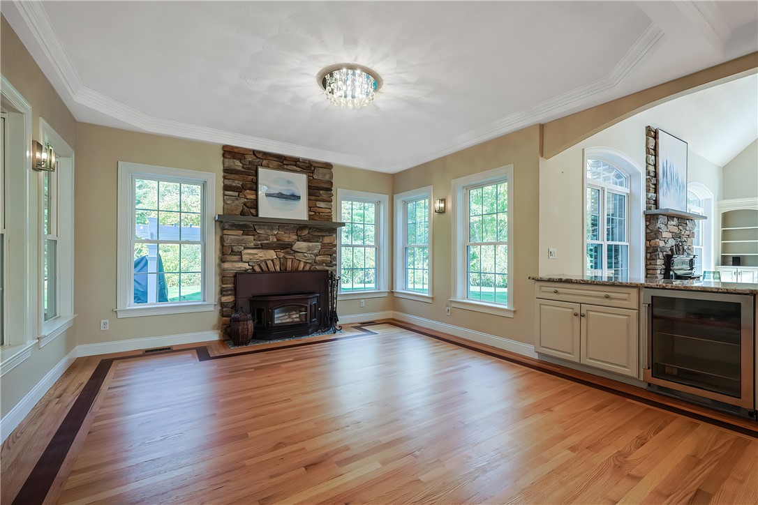 321 Greenville Road North Smithfield, RI 02896 - Photo 11 of 50 Cozy family room with stunning stone fireplace