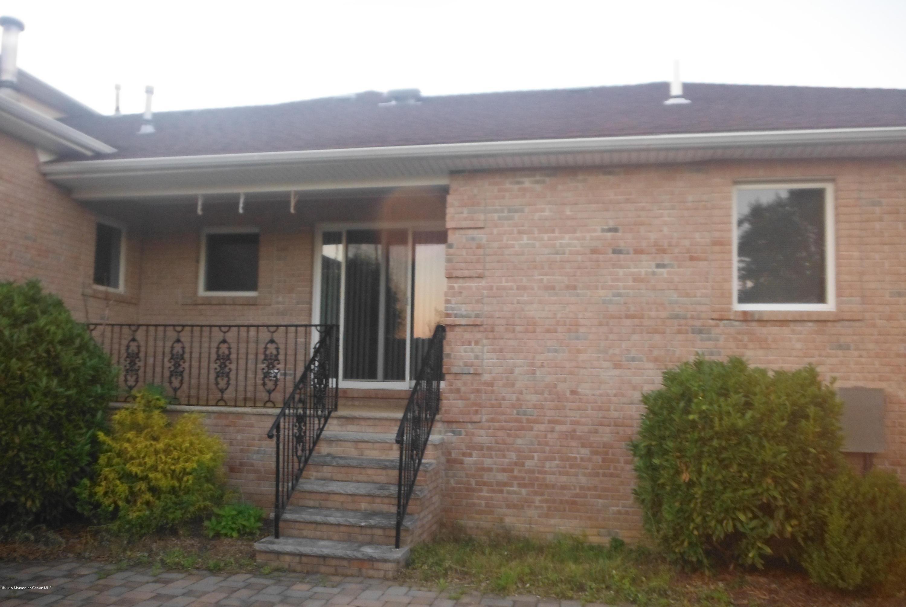 41 McCaffery Road Manalapan, NJ 07726 - Photo 27 of 31 STEPS WITH SLIDER ENTRANCE_crop