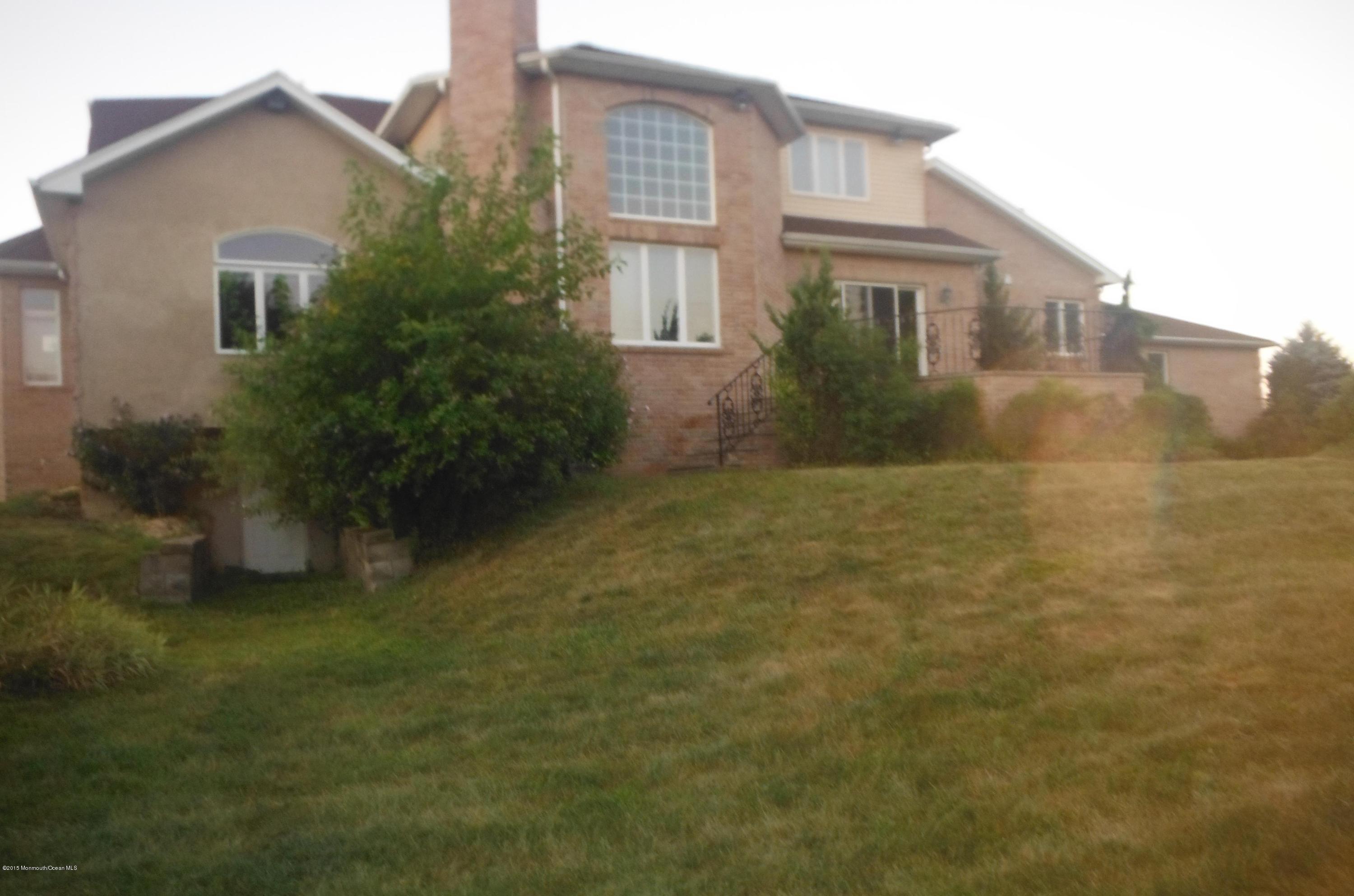 41 McCaffery Road Manalapan, NJ 07726 - Photo 30 of 31 Rear