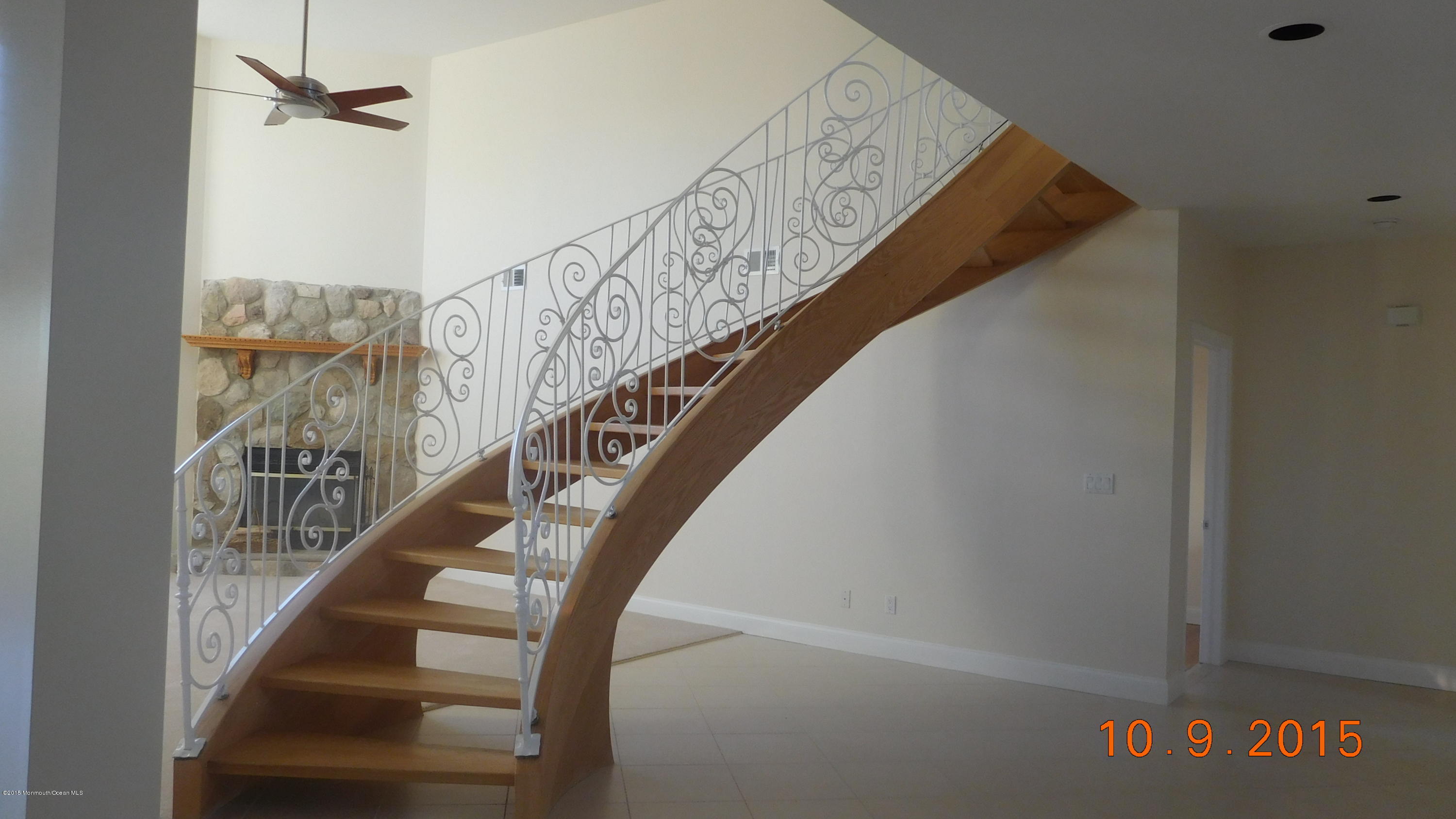 41 McCaffery Road Manalapan, NJ 07726 - Photo 5 of 31 Staircase to second level