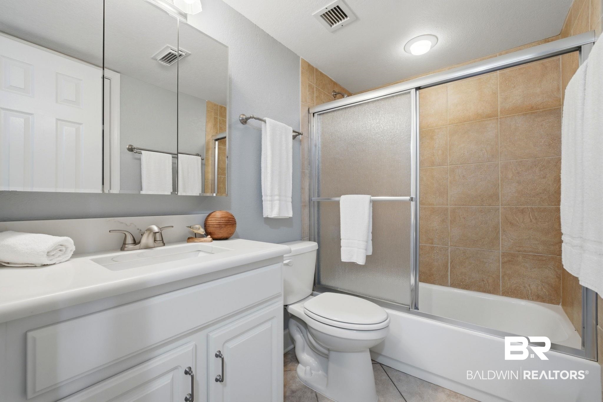 16284 Perdido Key Drive, Unit 912 Perdido Key, FL 32507 - Photo 37 of 49 Full bath featuring vanity, bath / shower combo with glass door, and light tile patterned flooring