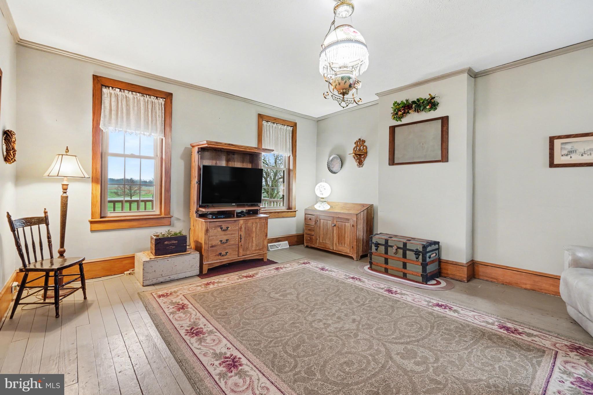 5505 Olde Scotland Road Shippensburg, PA 17257 - Photo 13 of 50 a living room with furniture and a flat screen tv