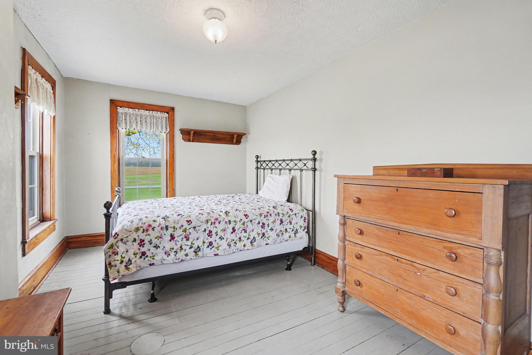 5505 Olde Scotland Road Shippensburg, PA 17257 - Photo 23 of 50 a bedroom with a bed and a dresser