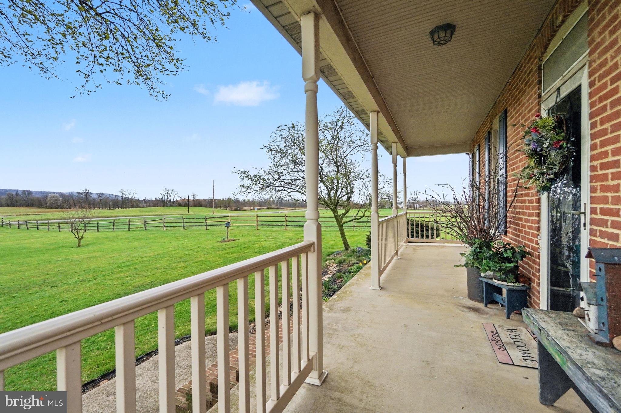 5505 Olde Scotland Road Shippensburg, PA 17257 - Photo 36 of 50 a view of a porch with a yard