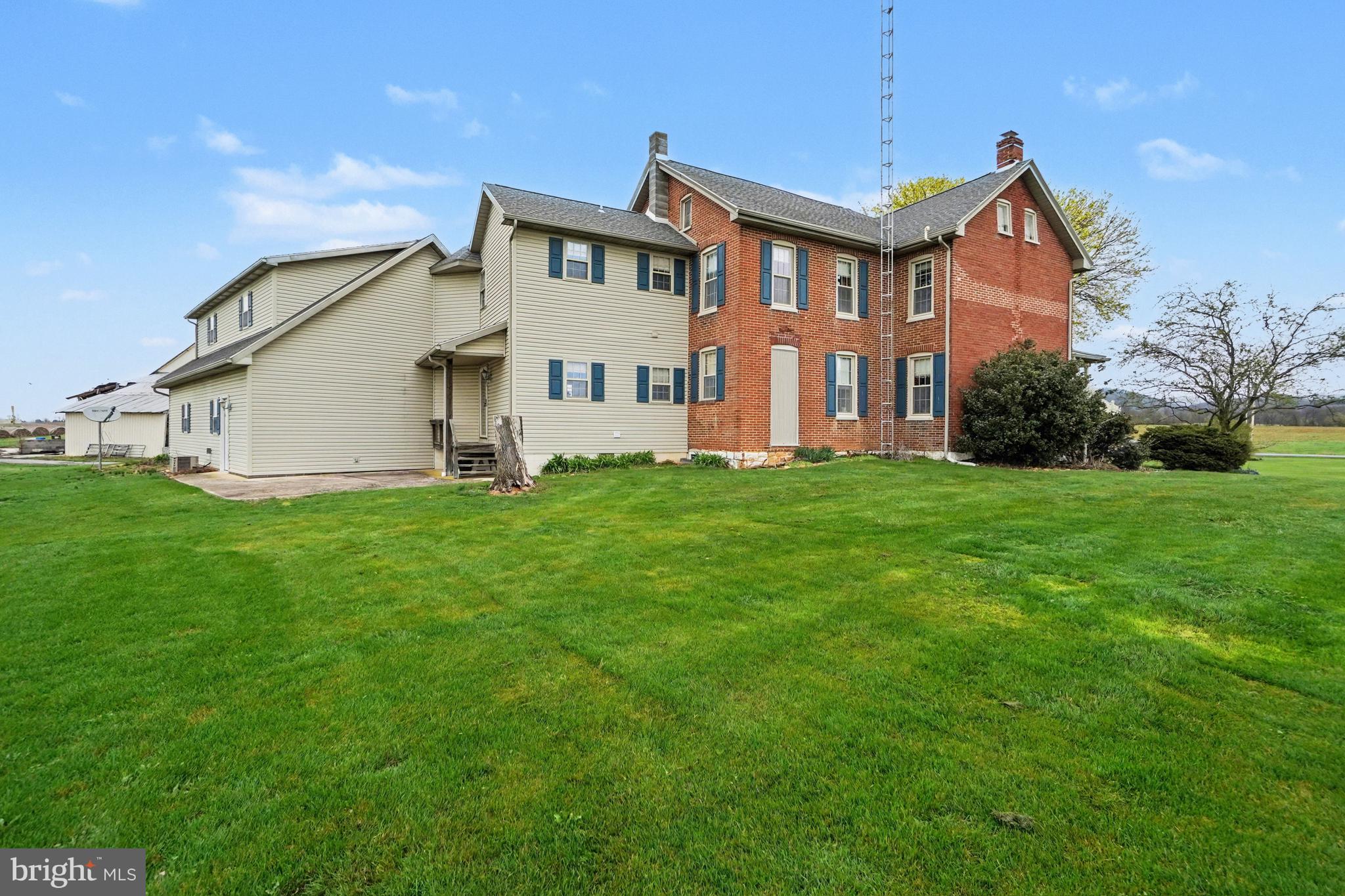 5505 Olde Scotland Road Shippensburg, PA 17257 - Photo 40 of 50 a front view of a house with a yard and trees
