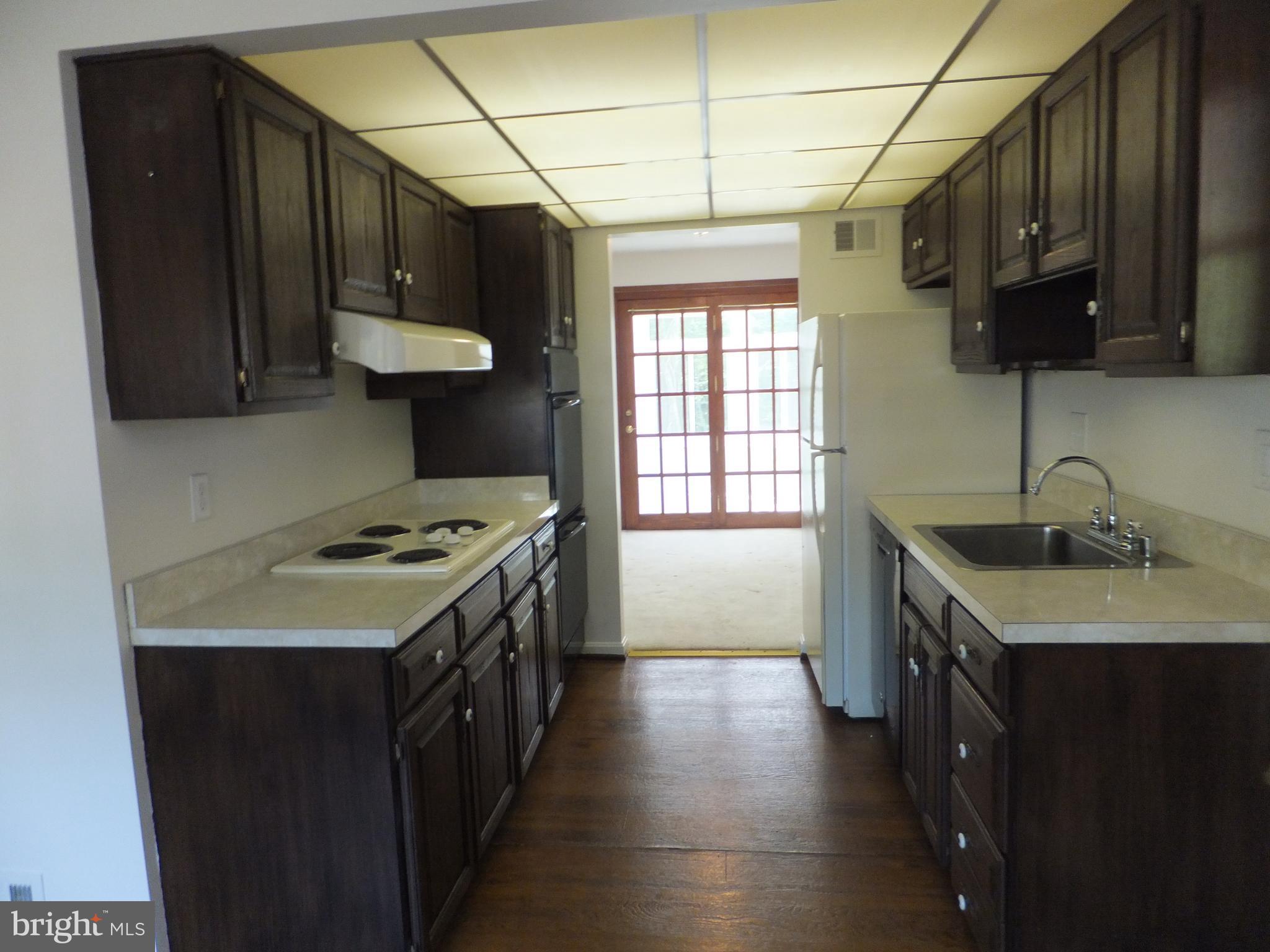 16205 Jerald Road Laurel, MD 20707 - Photo 18 of 47 KITCHEN w /DUAL WALL OVENS & COOKTOP