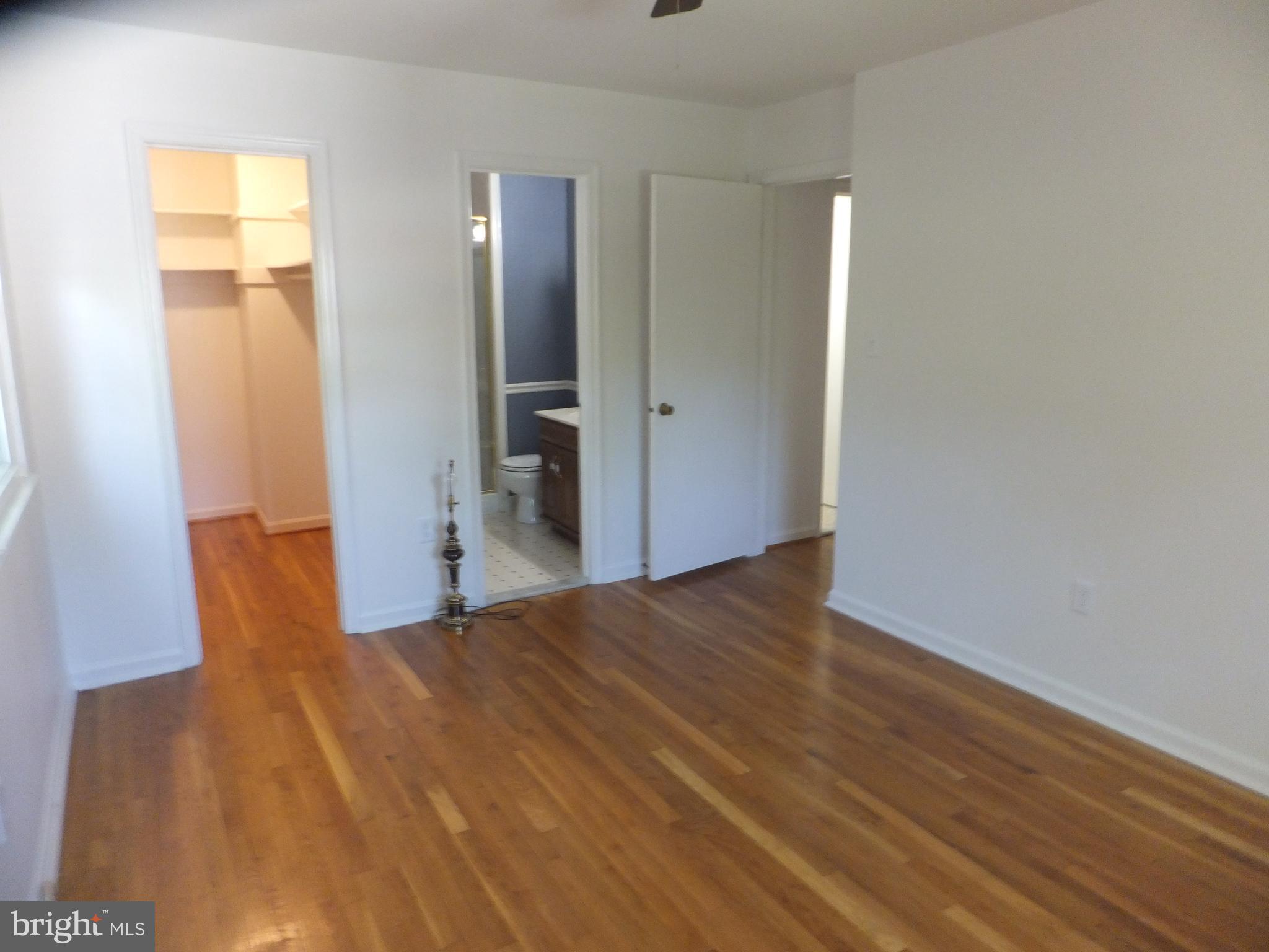 16205 Jerald Road Laurel, MD 20707 - Photo 34 of 47 MASTER BEDROOM w/ WALK-IN CLOSET & FULL BATH