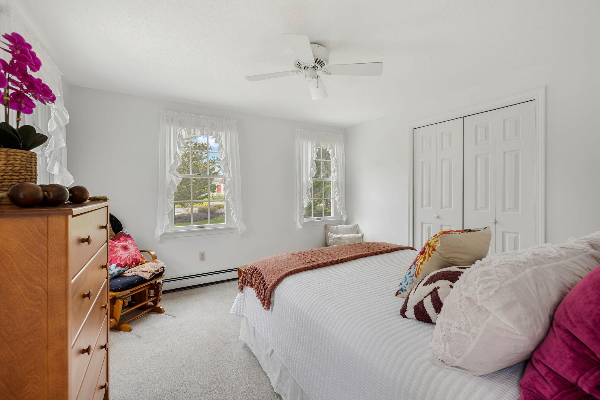 9 Raymond Way Eastham, MA 02642 - Photo 15 of 27 a bedroom with a bed and a window