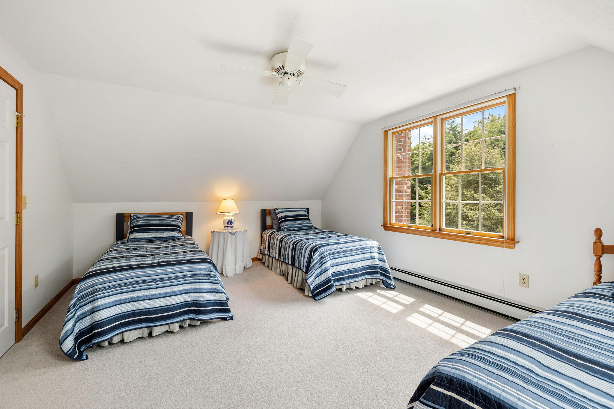 9 Raymond Way Eastham, MA 02642 - Photo 17 of 27 a bedroom with double bed and a window