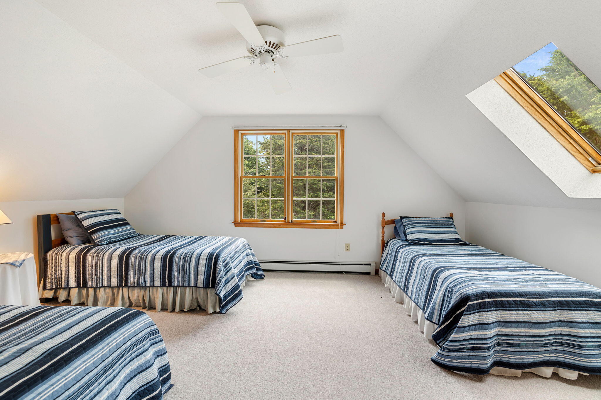 9 Raymond Way Eastham, MA 02642 - Photo 18 of 27 a bedroom with a bed and a window