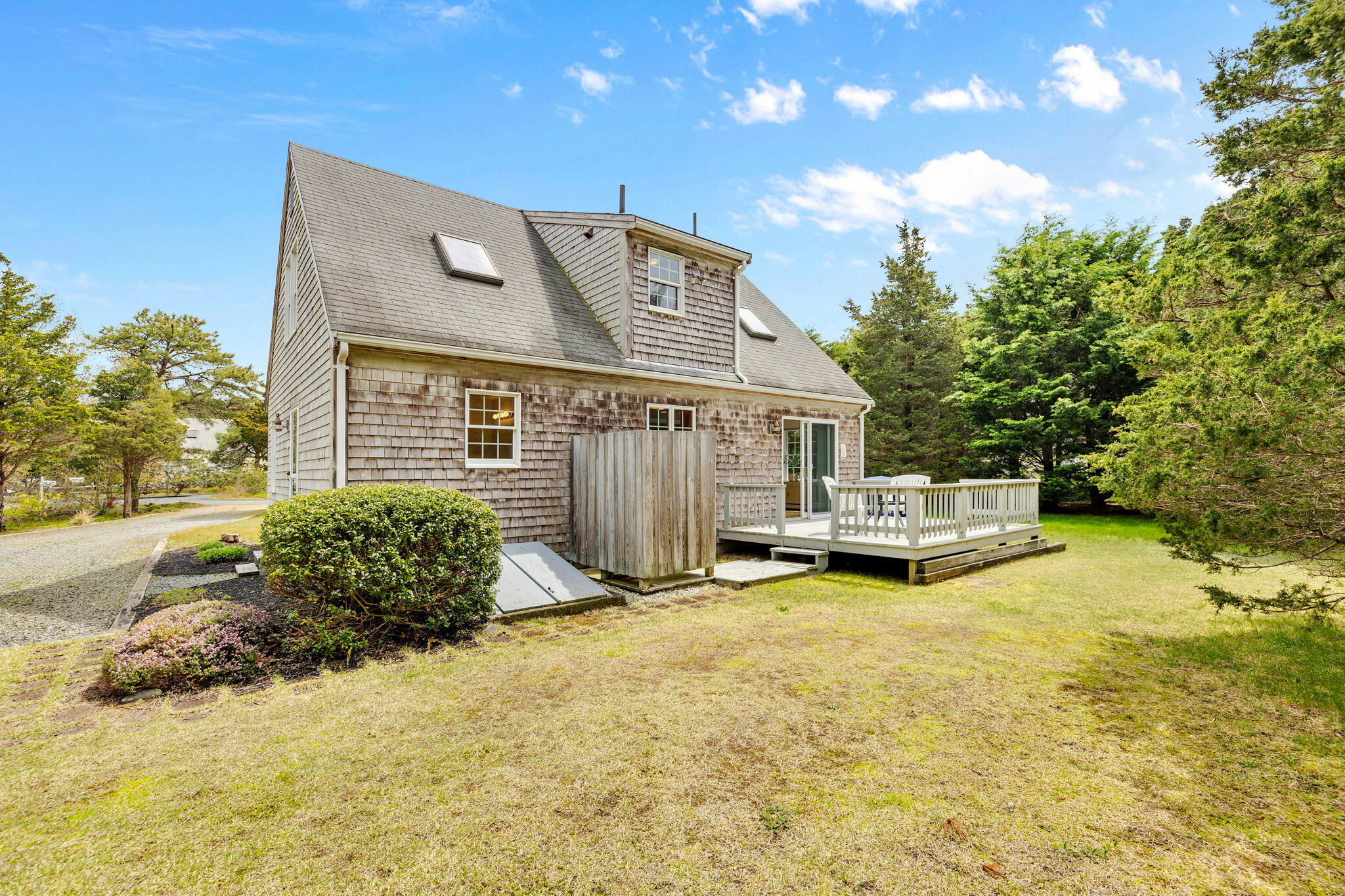 9 Raymond Way Eastham, MA 02642 - Photo 23 of 27 a view of a house with swimming pool and sitting area