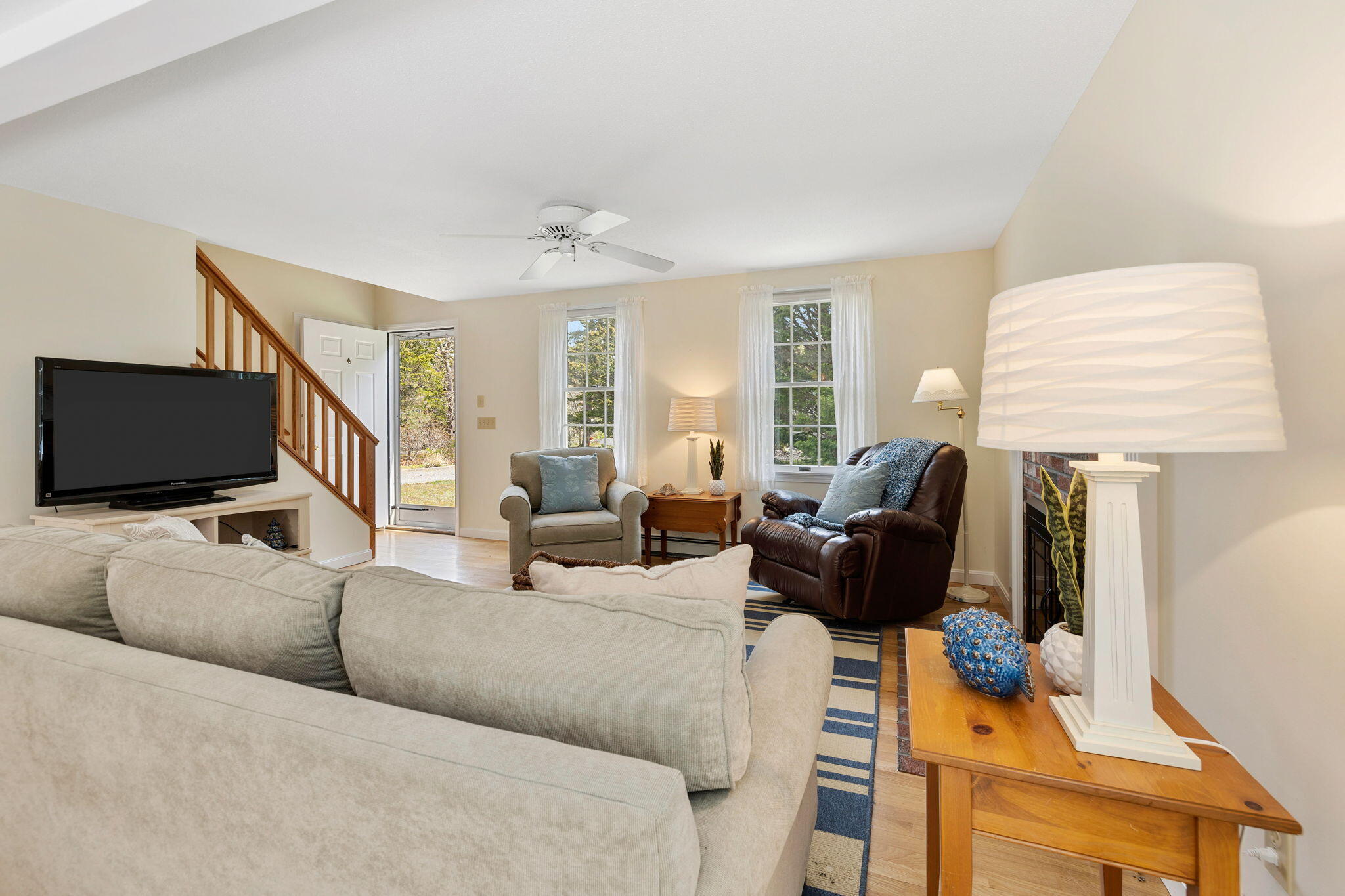 9 Raymond Way Eastham, MA 02642 - Photo 5 of 27 a living room with furniture and a flat screen tv
