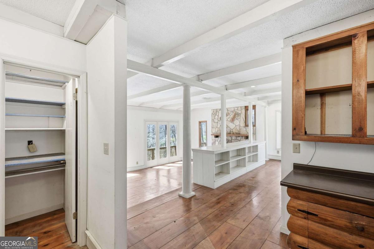 508 Providence Road Statham, GA 30666 - Photo 17 of 39 a living room with wooden floor and a window