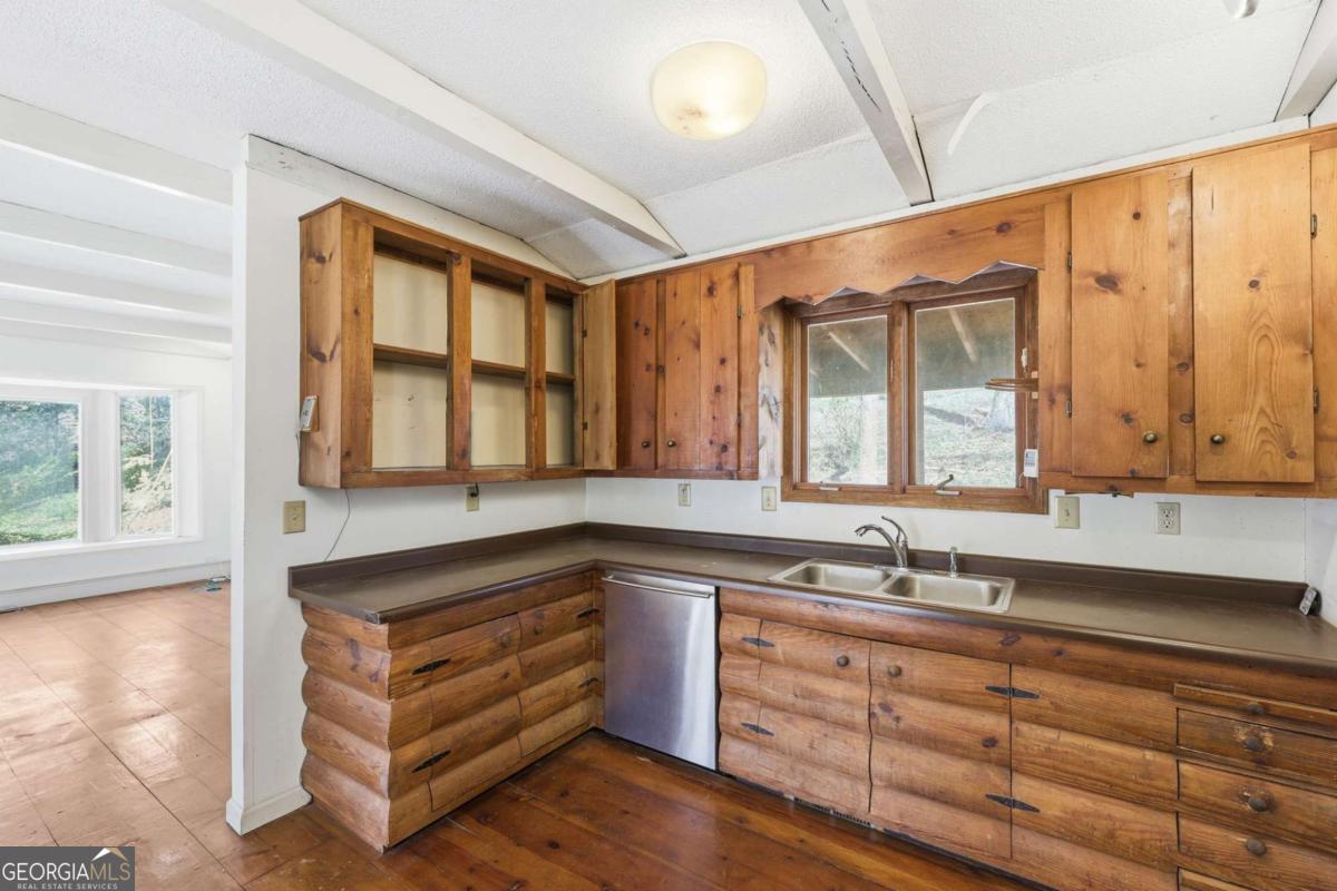 508 Providence Road Statham, GA 30666 - Photo 18 of 39 a bathroom with a sink and a large mirror