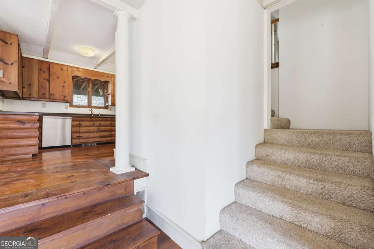 508 Providence Road Statham, GA 30666 - Photo 25 of 39 a view of entryway and hall with wooden floor
