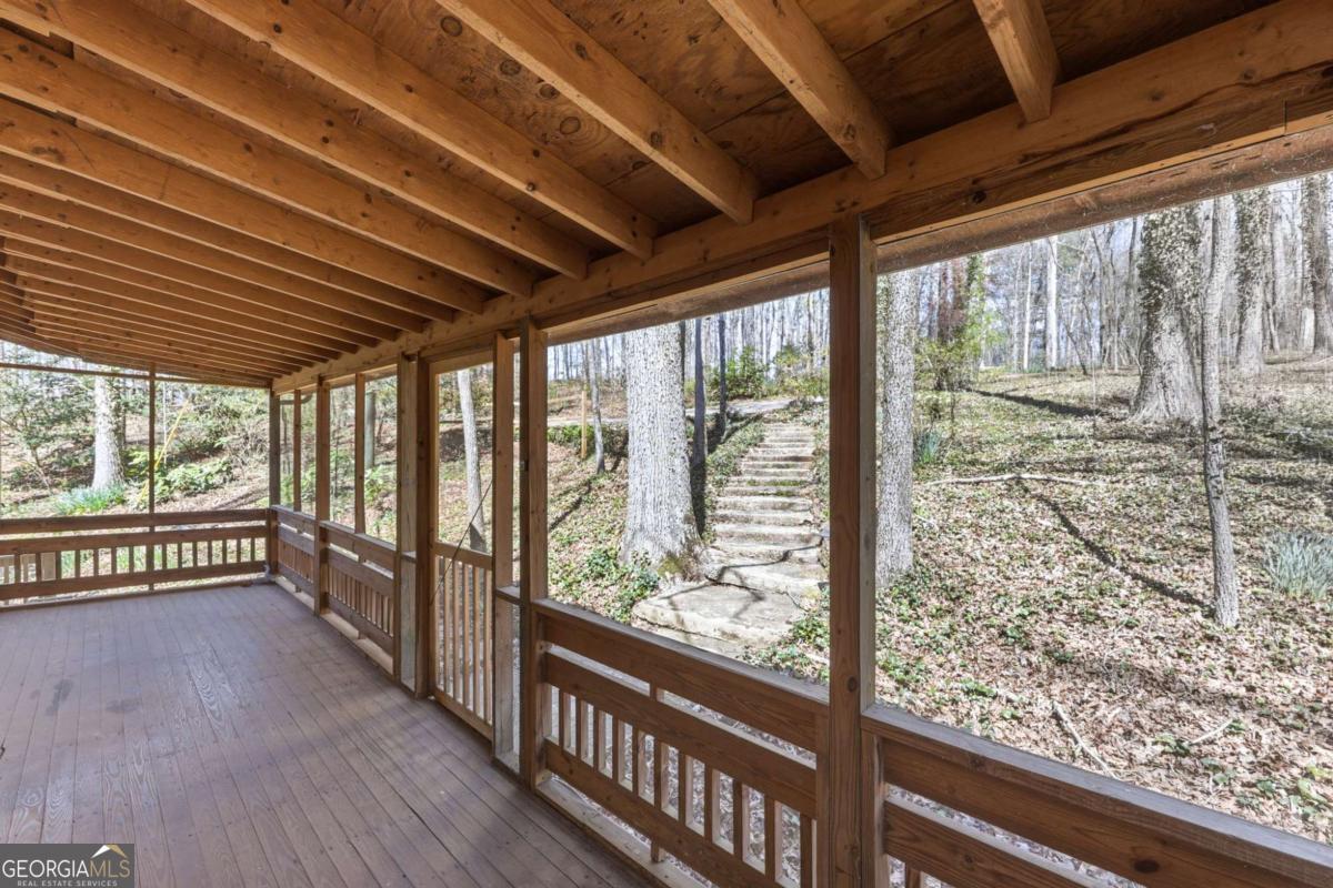508 Providence Road Statham, GA 30666 - Photo 3 of 39 a view of a porch with wooden floor