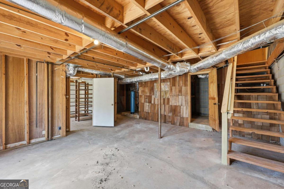 508 Providence Road Statham, GA 30666 - Photo 31 of 39 a view of an empty room with stairs